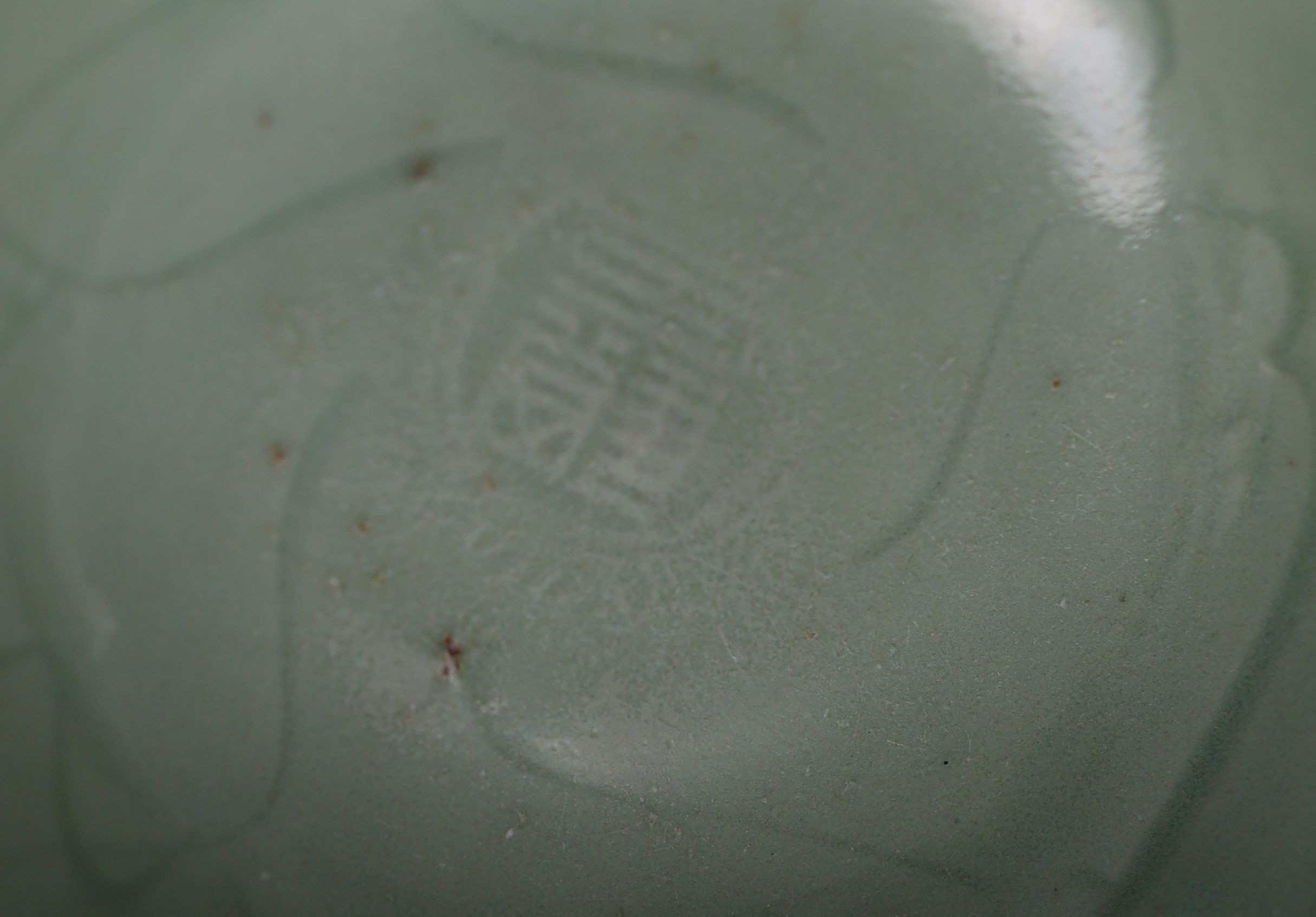 A Chinese Longquan celadon ‘Gu Shi’ bowl, 15th century, 13.8cm diameter, hairline crack